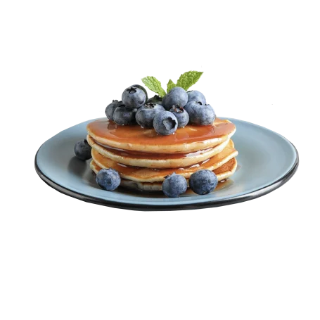 Pancake Türmchen Stapel Pancakes mit Beeren und Ahornsirup.